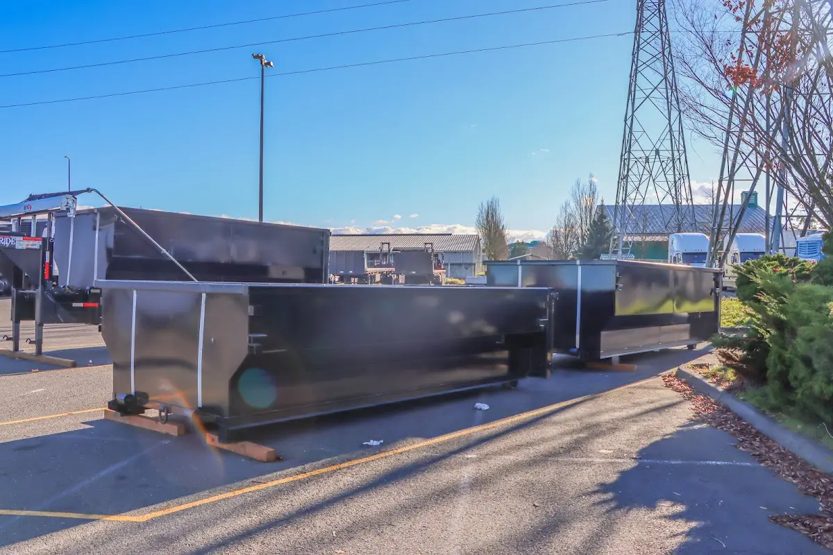 Roll-off dumpster ready for waste disposal at job site for 2 Yard Dumpster Rental in Hillsdale